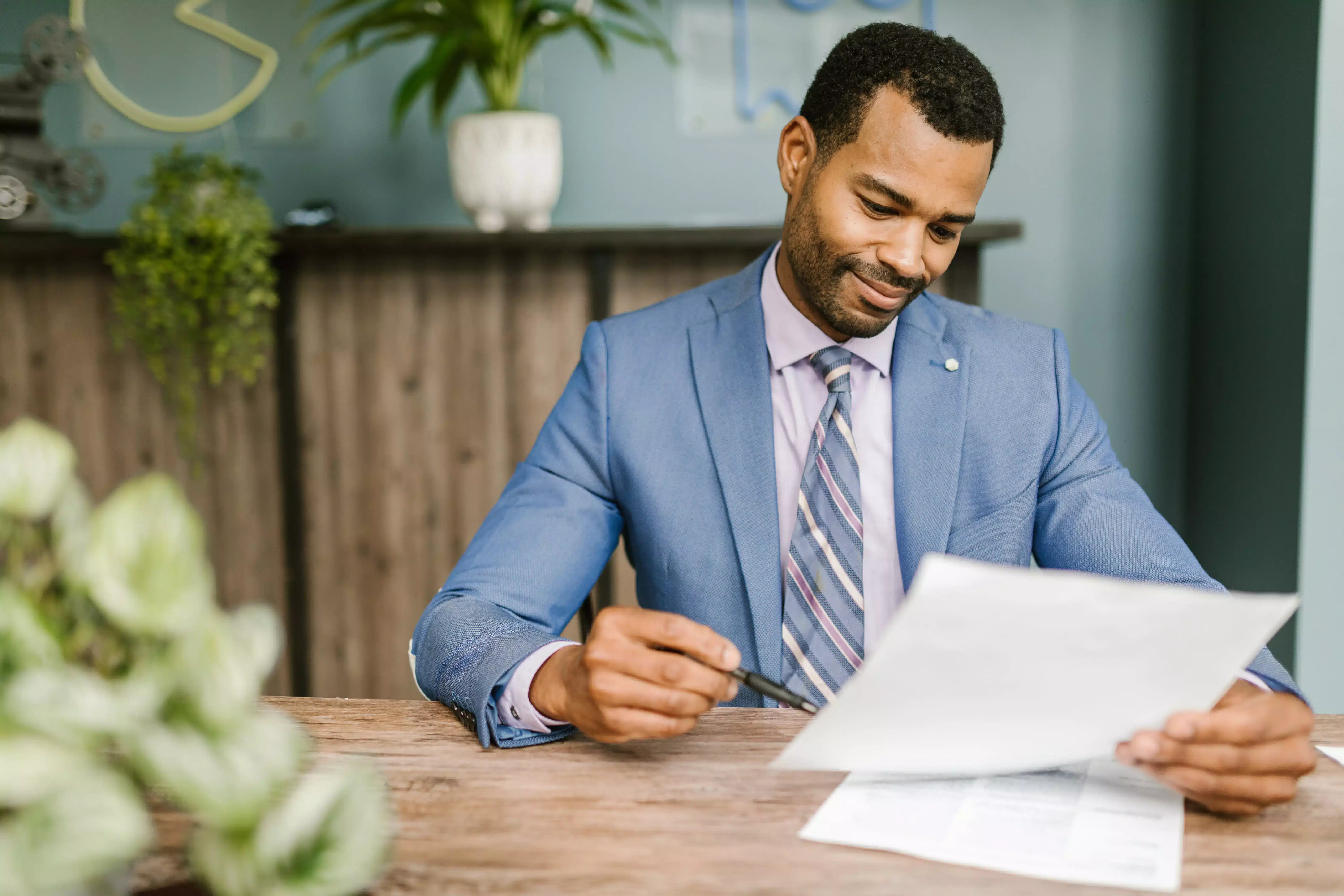 A broker reviewing financials